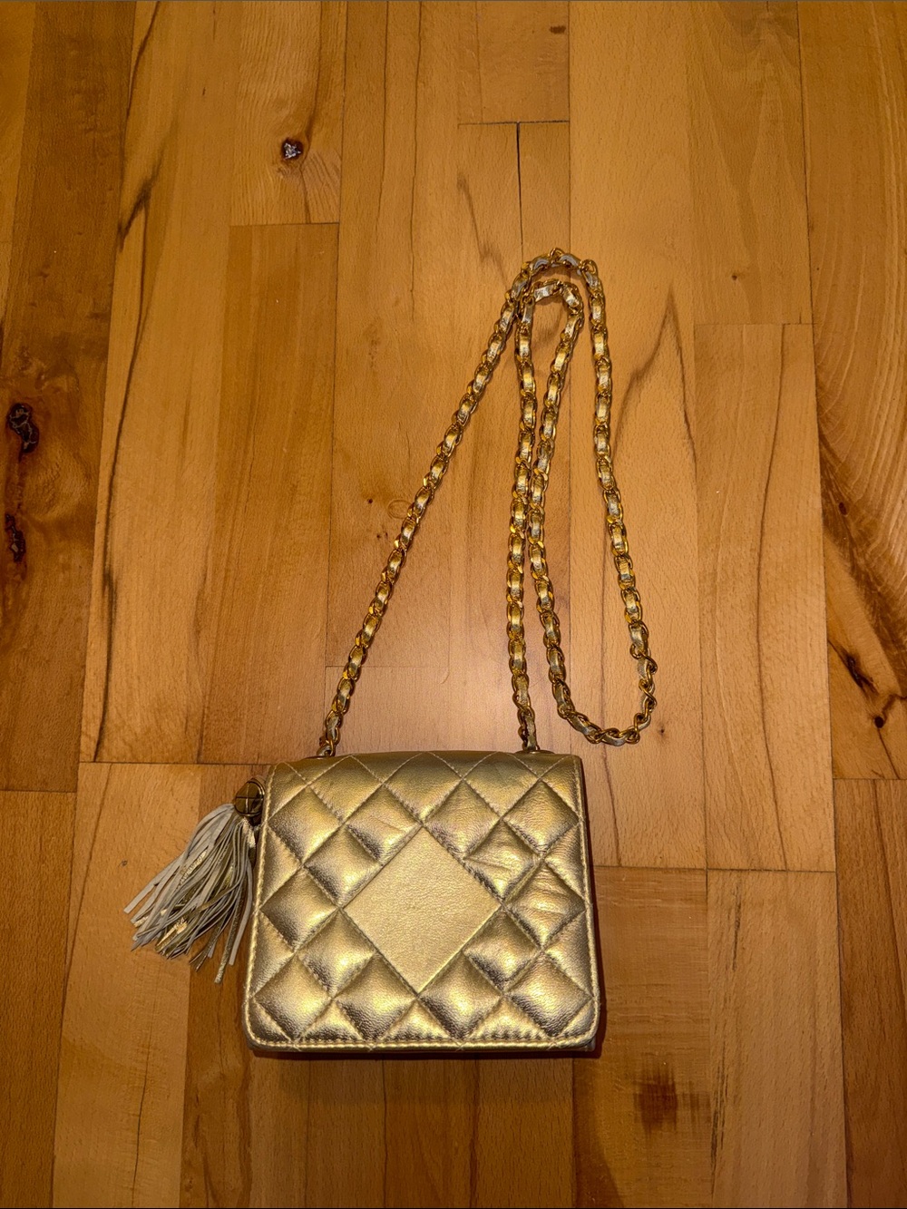Gold Quilted Crossbody Bag with Tassel